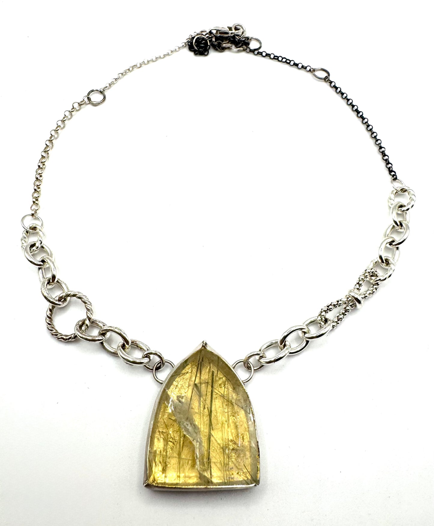 Medusa’s Undoing in Sterling silver and 23k Gold Leaf with Rutilated green quartz
