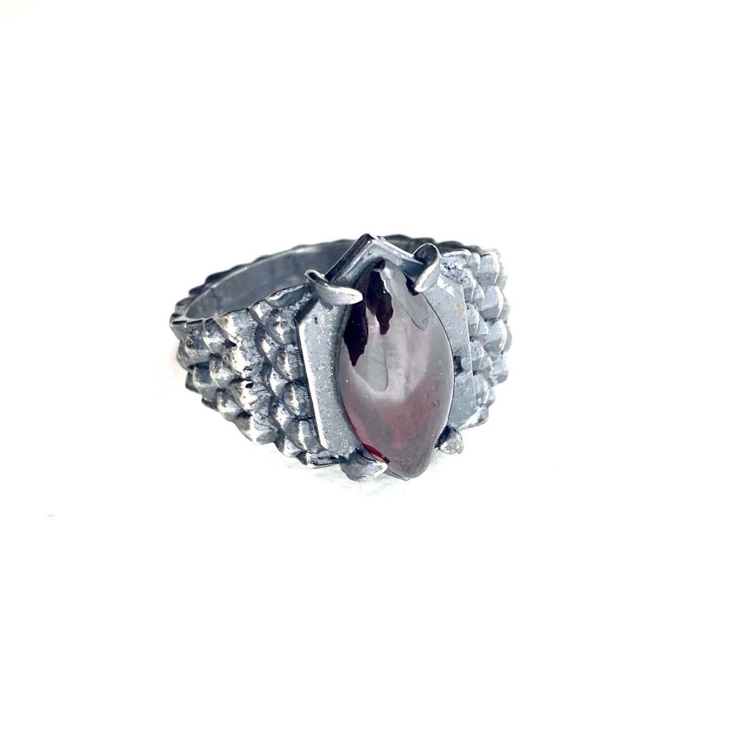 Dragon’s Claw with Garnet in Sterling Silver