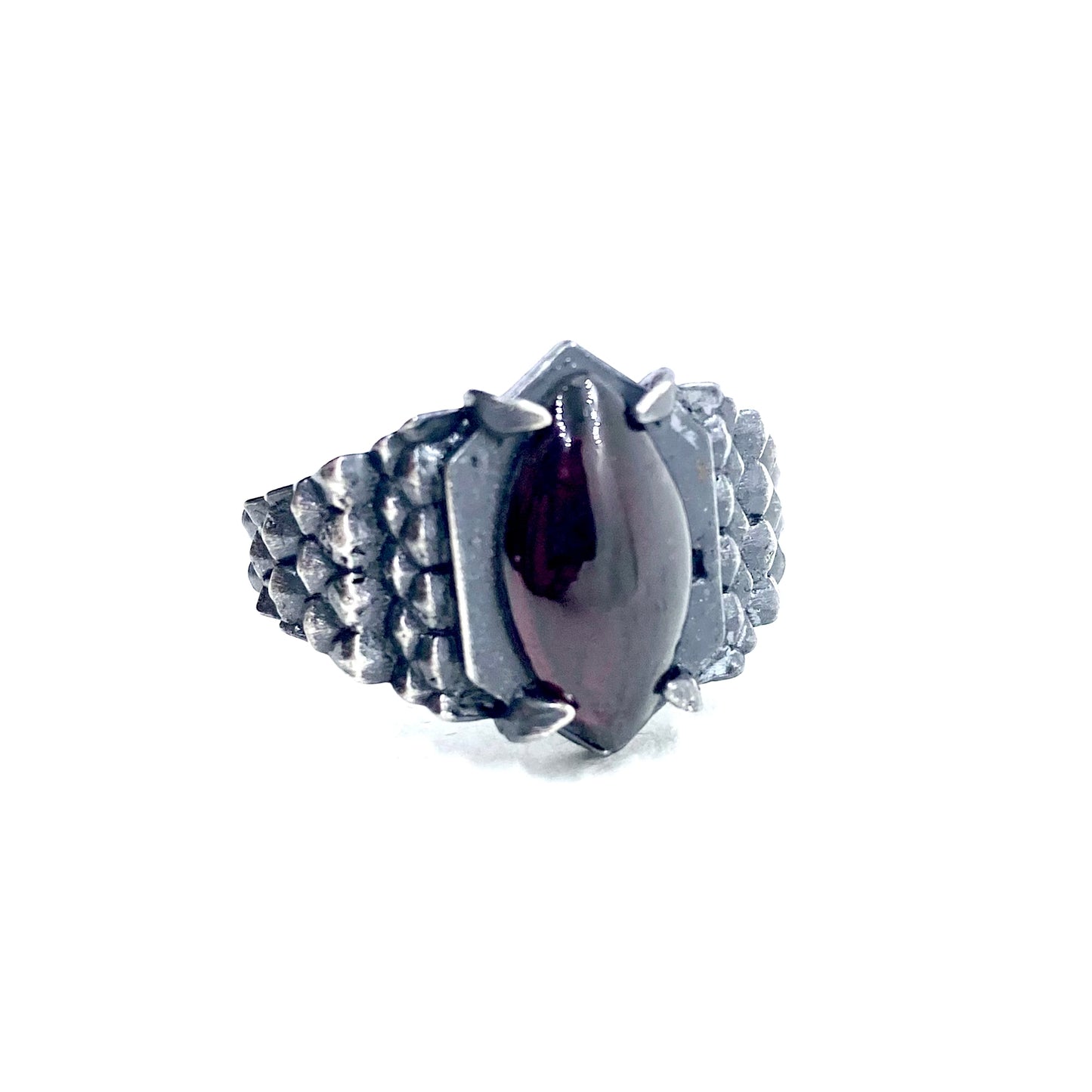 Dragon’s Claw with Garnet in Sterling Silver