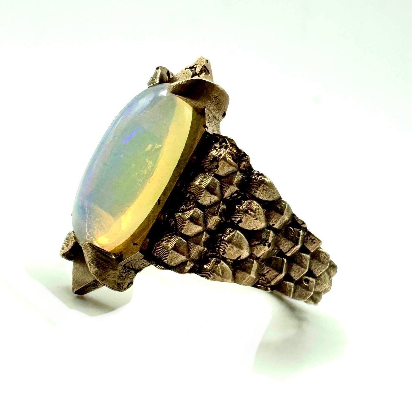 Serpent’s Claw Ring with Welo Opal in Bronze