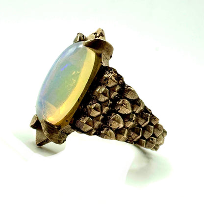 Serpent’s Claw Ring with Welo Opal in Bronze