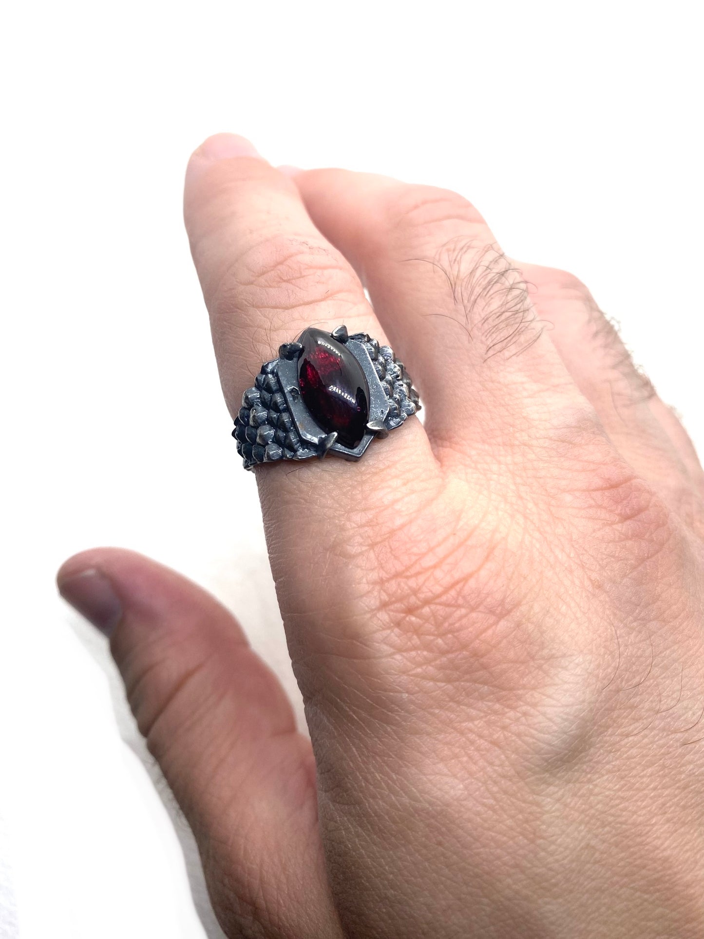 Dragon’s Claw with Garnet in Sterling Silver