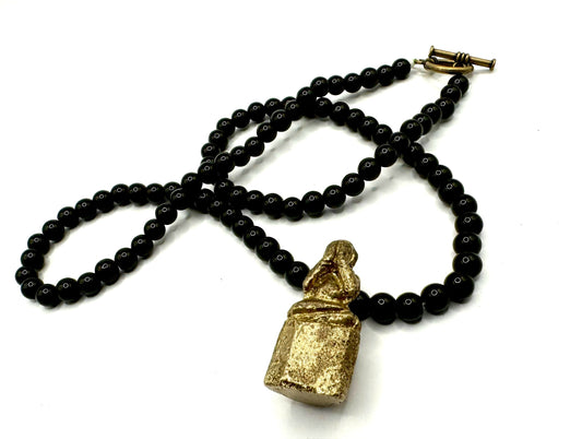 Bronze Banded Monk Talisman on a Black Onyx Beaded Necklace with Bronze Toggle