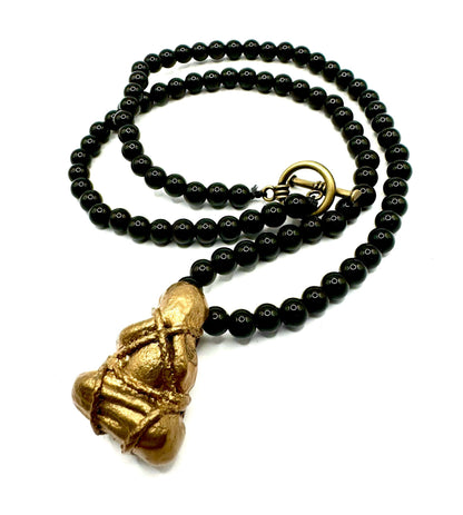 Bronze Banded Monk Talisman on a Black Onyx Beaded Necklace with Bronze Toggle