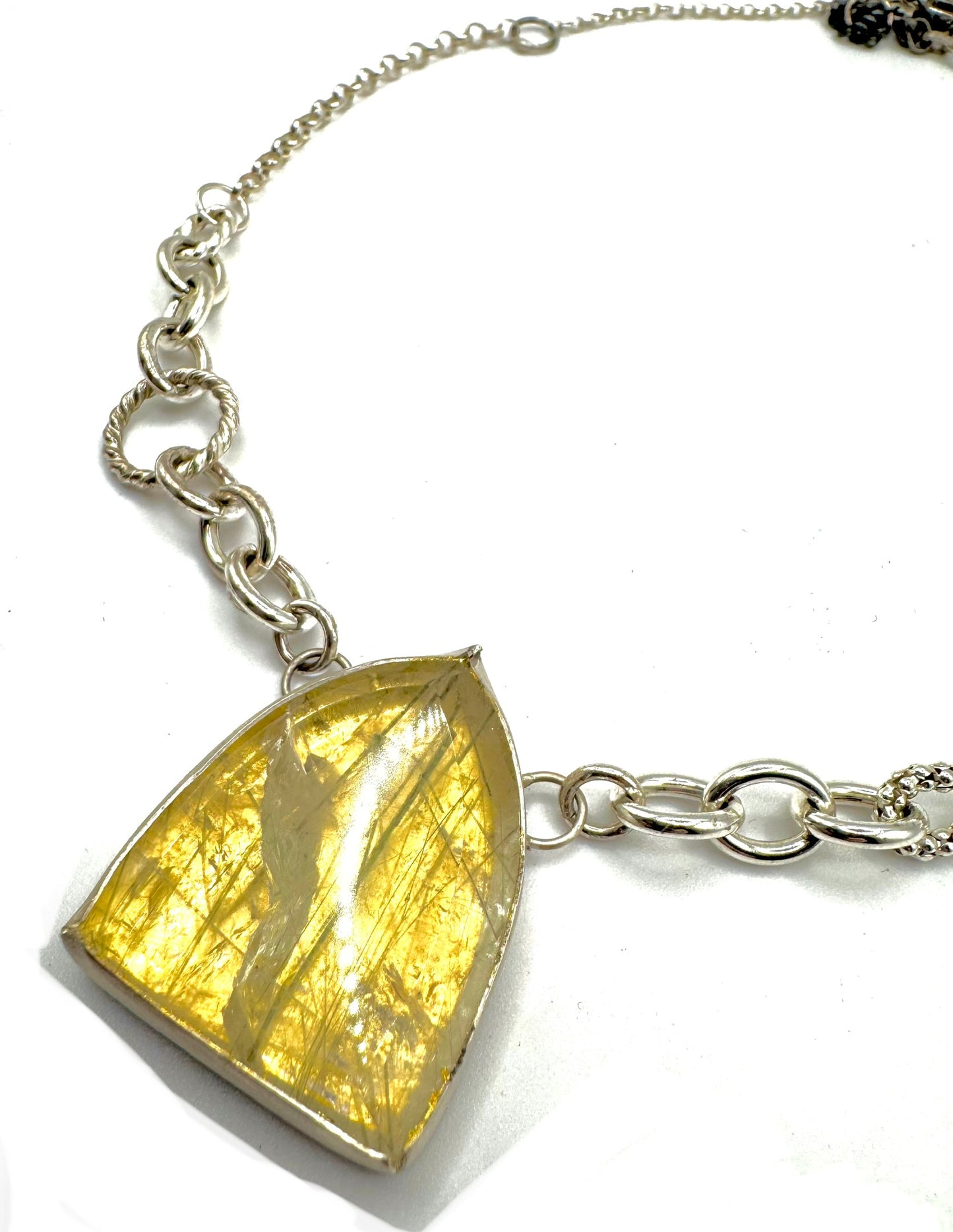 Medusa’s Undoing in Sterling silver and 23k Gold Leaf with Rutilated green quartz