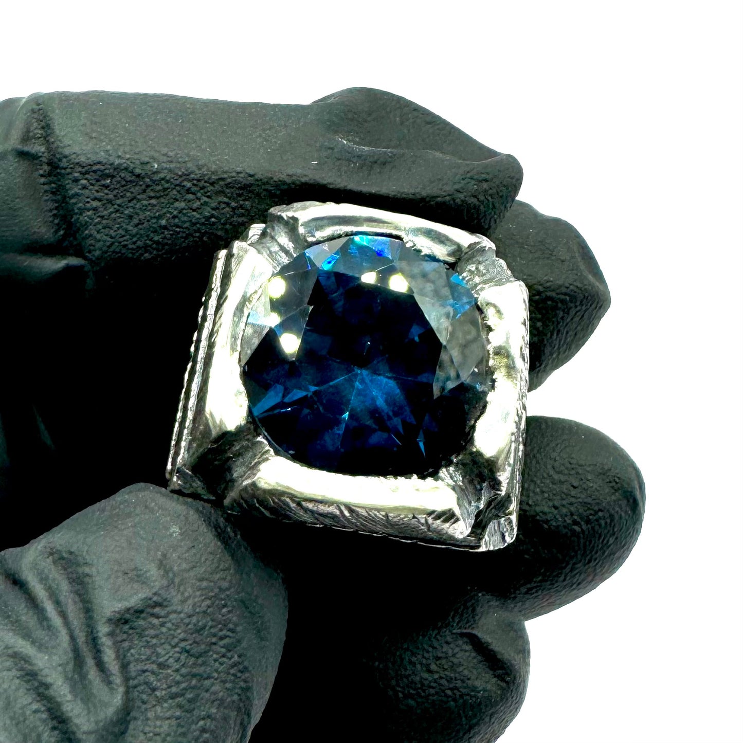 Ring of Shifting Light Set with Blue Color Changing Spinel in Sterling Silver