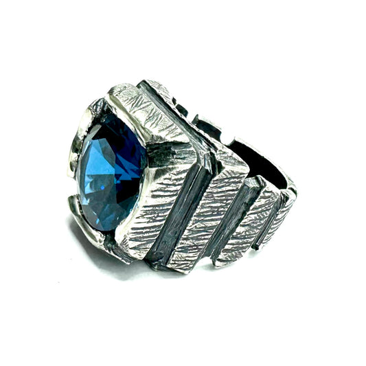 Ring of Shifting Light Set with Blue Color Changing Spinel in Sterling Silver