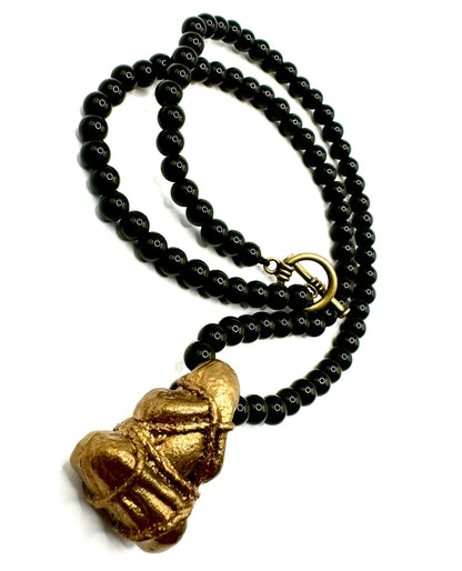 Bronze Banded Monk Talisman on a Black Onyx Beaded Necklace with Bronze Toggle