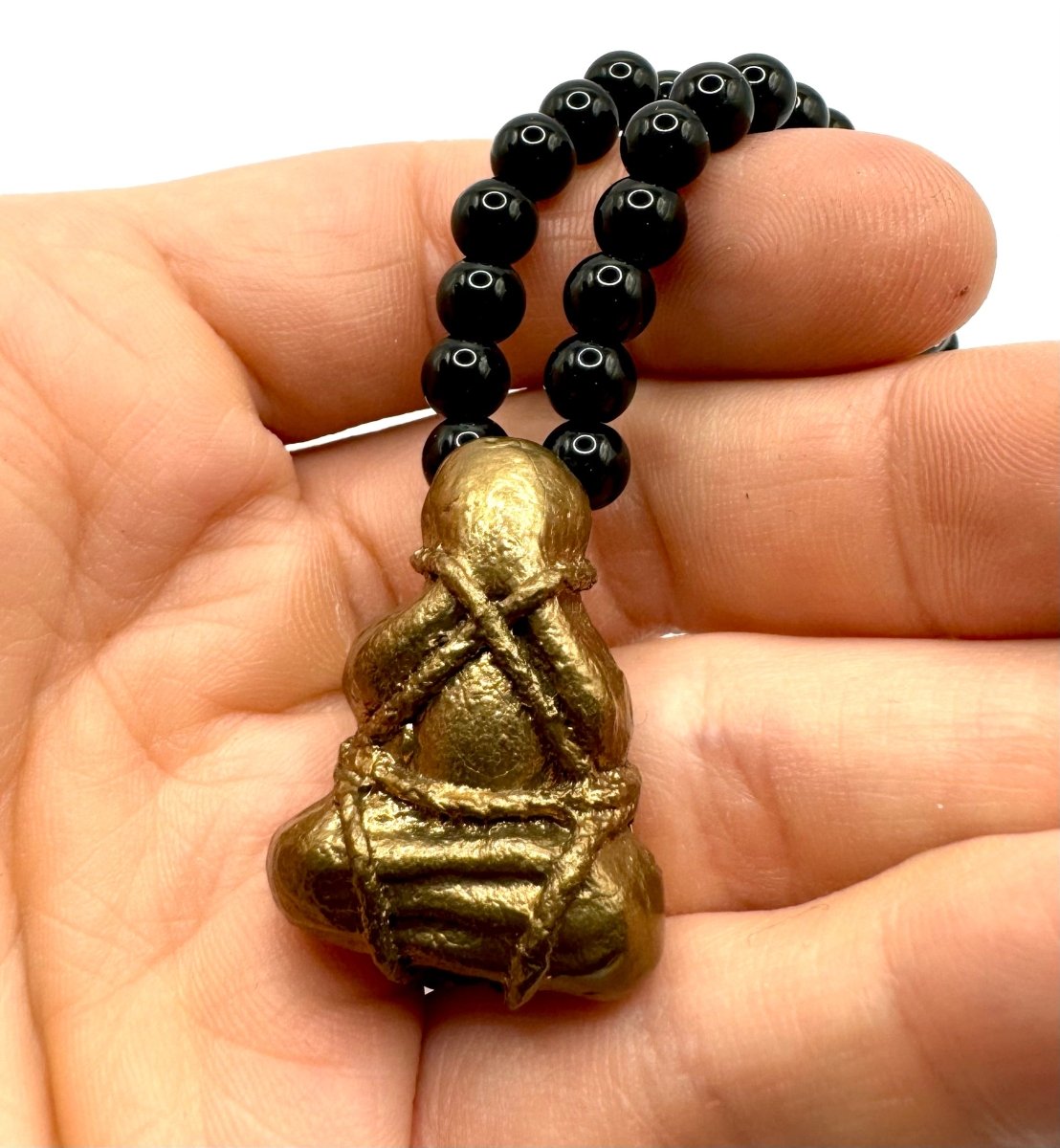 Bronze Banded Monk Talisman on a Black Onyx Beaded Necklace with Bronze Toggle - Julian The 2nd - Bronze Banded Monk Talisman on a Black Onyx Beaded Necklace with Bronze Toggle